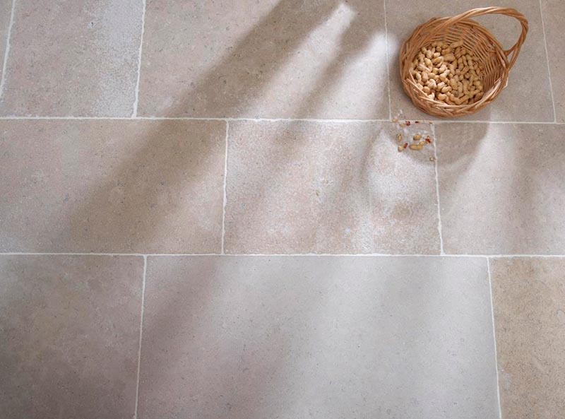 Soft coloured and textured natural stone flooring